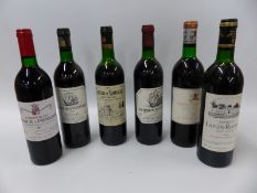 Six bottles of red wine comprising Chateau Pape Clement 1986, Chateau Latour a Pomerol 1989,