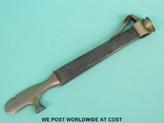 A niello white metal smoker's compendium tool comprising cigar cutter, bowl clearer and pipe tamper,