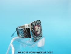 A silver ring by Stephen Webster for Wedgwood depicting roses