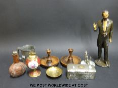 A pewter mug, window dressing model, candle stick,