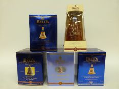 Five boxed 8 year aged commemorative Bell's whisky bells comprising the Millennium Edition,