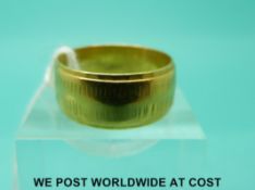 A 22ct gold wedding band (Size Q, 7.