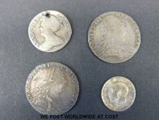 Two George III 1787 shillings, stop over head, together with a holed Queen Anne sixpence,