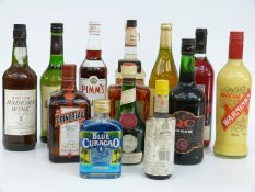 A mixed lot of liqueurs to include Calvados, Cointreau, Bénédictine,