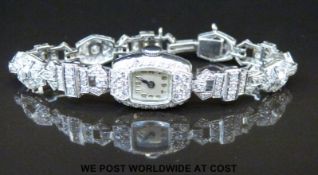 Art Deco platinum ladies cocktail wristwatch inset with 141 old cut diamonds, case size 14x20mm, 23.