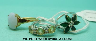 A 9ct gold ring set with a moonstone,