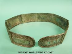 A possibly Burmese white metal belt, each hinge panel with embossed border and central plain panel,