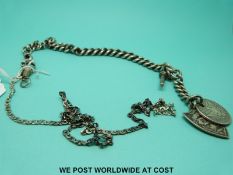 A hallmarked silver graduated Albert with RAOB fob and American quarter dollar fob,