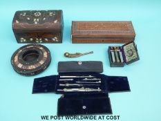 A quantity of collectables to include Eastern inlaid boxes, a razor set, a drawing set,