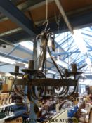 A wrought iron five-branch chandelier