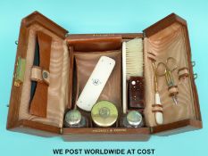 A leather Shadwell and Kerton Vanity case with contents including hallmarked silver gilt mounted