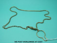 A yellow metal watch chain made up of snake links (20.