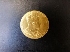 An official gold medal coin by G W de Saulles to commemorate the coronation of Edward VII 1902,