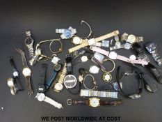 Over 200 various vintage and modern ladies and gentleman's wristwatches.