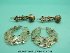 A pair of yellow metal earrings set with paste and another pair of yellow metal earrings set with