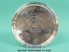 A Victorian hallmarked silver salver or tray with reeded rim, raised on three shallow feet,