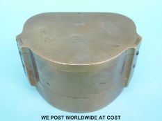 A brass/bonze denture mould box marked ADCO made in London, England (width 10.