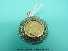 A 1903 gold half sovereign in 9ct gold mount (6.