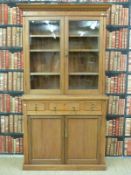 A pine dresser with glazed top section,