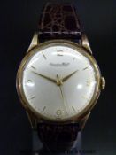 International Watch Company (IWC) 18ct gold gentleman's wristwatch with gold hands, Arabic numerals,