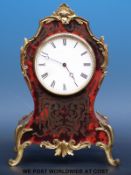 A gilt metal mounted Boulle tortoiseshell and brass mantel clock with single train movement stamped