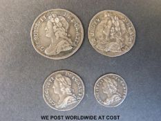 Four George II maundy coins comprising a 1735 fourpence, a 1736 threepence, a 1743 twopence,