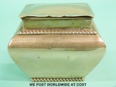 A hallmarked silver tea caddy of bulbous form, width 8cm,
