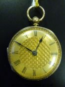 An 18ct gold pocket watch with engine turned and engraved self-coloured dial, black Roman numerals,
