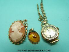 An amber pendant with 9ct mount,