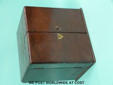 A 19thC mahogany brass-bound apothecary cabinet with fold-out doors,