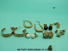 Seven pairs of 9ct gold earrings including pearl set,