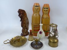 Two Russian doll vodka bottle holders, a miniature Bells, some decorative brassware,