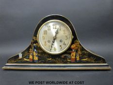 A chinoiserie decorated lacquer Napoleon hat mantel clock in the manner of Asprey
