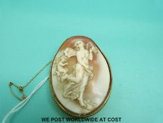 A 15ct gold brooch set with a large cameo