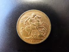 An 1892 gold full sovereign,