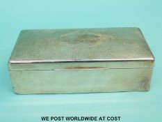 A hallmarked silver cigarette box,
