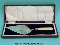 A cased hallmarked silver presentation trowel engarved 