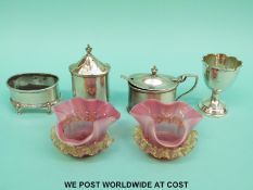 A Walker and Hall hallmarked silver three piece cruet and hallmarked silver egg cup (200g weighable