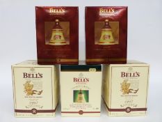 Five boxed 8 year aged Christmas Bell's whisky bells each 70cl, 40% vol comprising 1996 x 2,