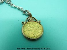 A 1914 gold half sovereign in yellow metal pendant mount (5.