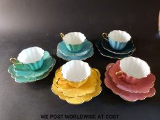 A harlequin set of Royal Stuart tea cups,