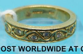 An 18ct gold ring set with diamonds by Stephen Webster (size L)