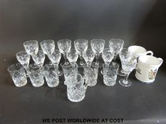 A suite of Royal Brierley drinking glasses and two Denby commemorative mugs