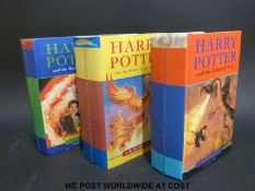 Three Harry Potter first edition hardback books; Goblet of Fire, Order of the Phoenix,