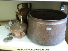 A large copper log bin,