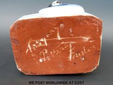 A Torquay Pottery toby jug together with a musical toby jug