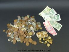 A quantity of sundry UK and overseas coinage, bank notes,