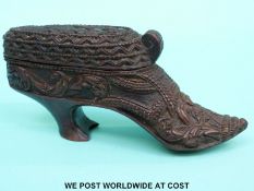 A possibly Scandinavian intricately carved snuff mull in the form of a shoe (6cm tall,