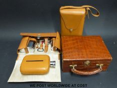 A crocodile skin jewellery box and two gentleman's cased flask sets