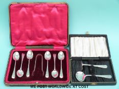 A cased set of hallmarked silver teaspoons and sugar nips and a cased silver pusher and spoon set